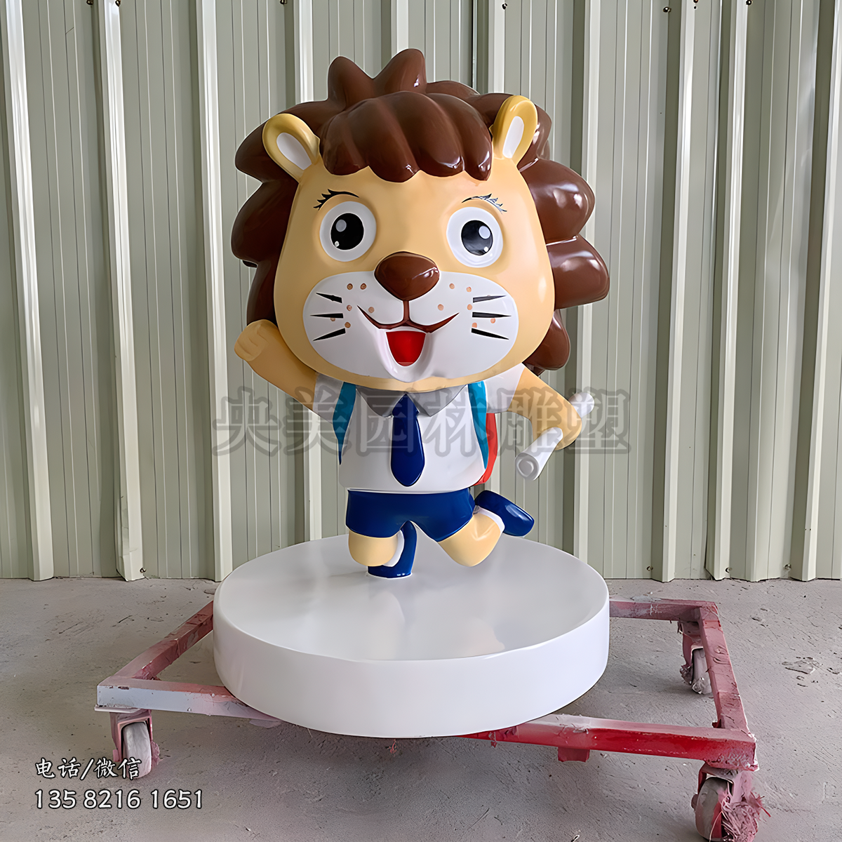 手拿試卷的小學(xué)生造型卡通獅子雕塑