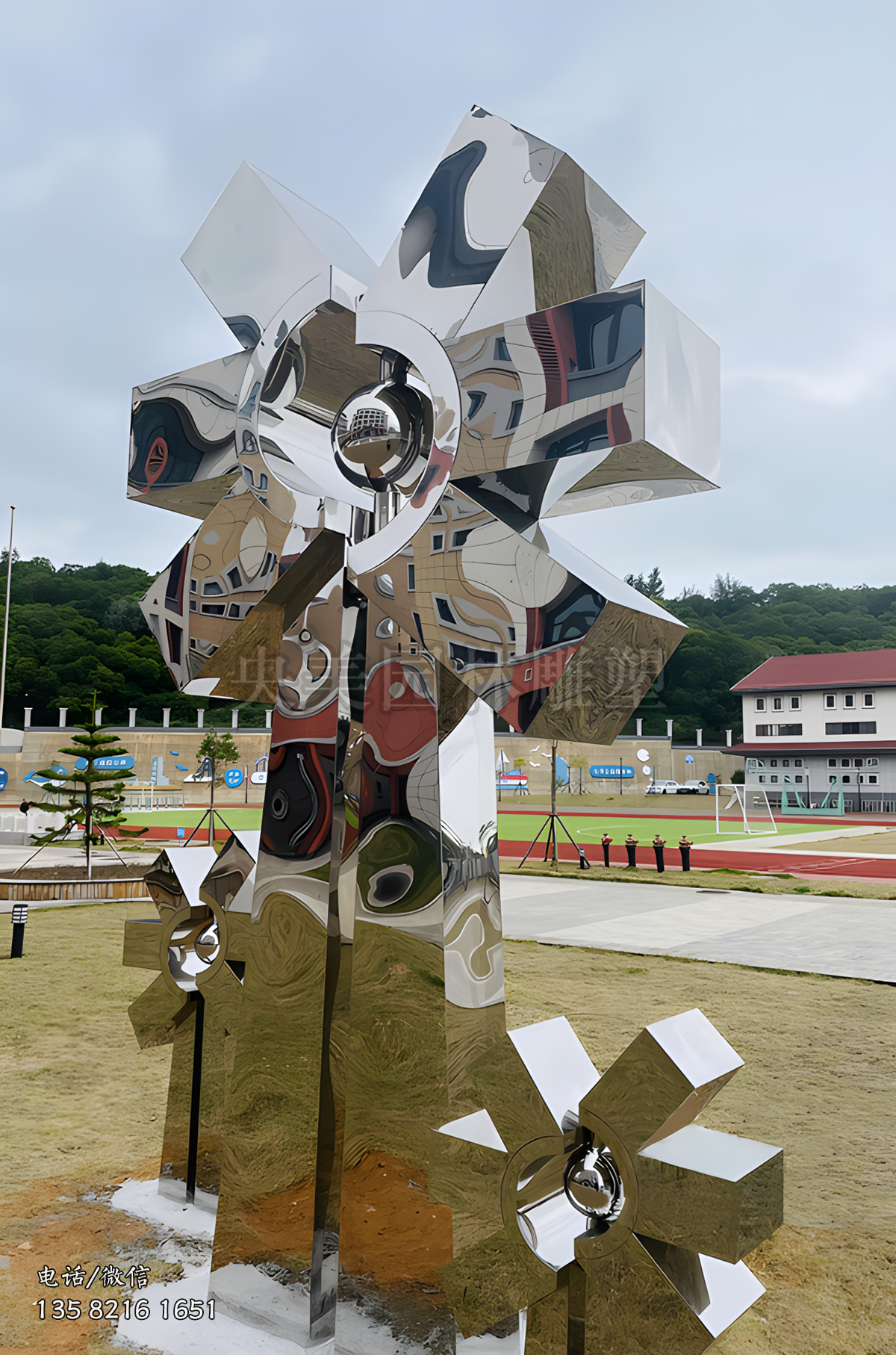 鏡面不銹鋼抽象風(fēng)車造型雕塑